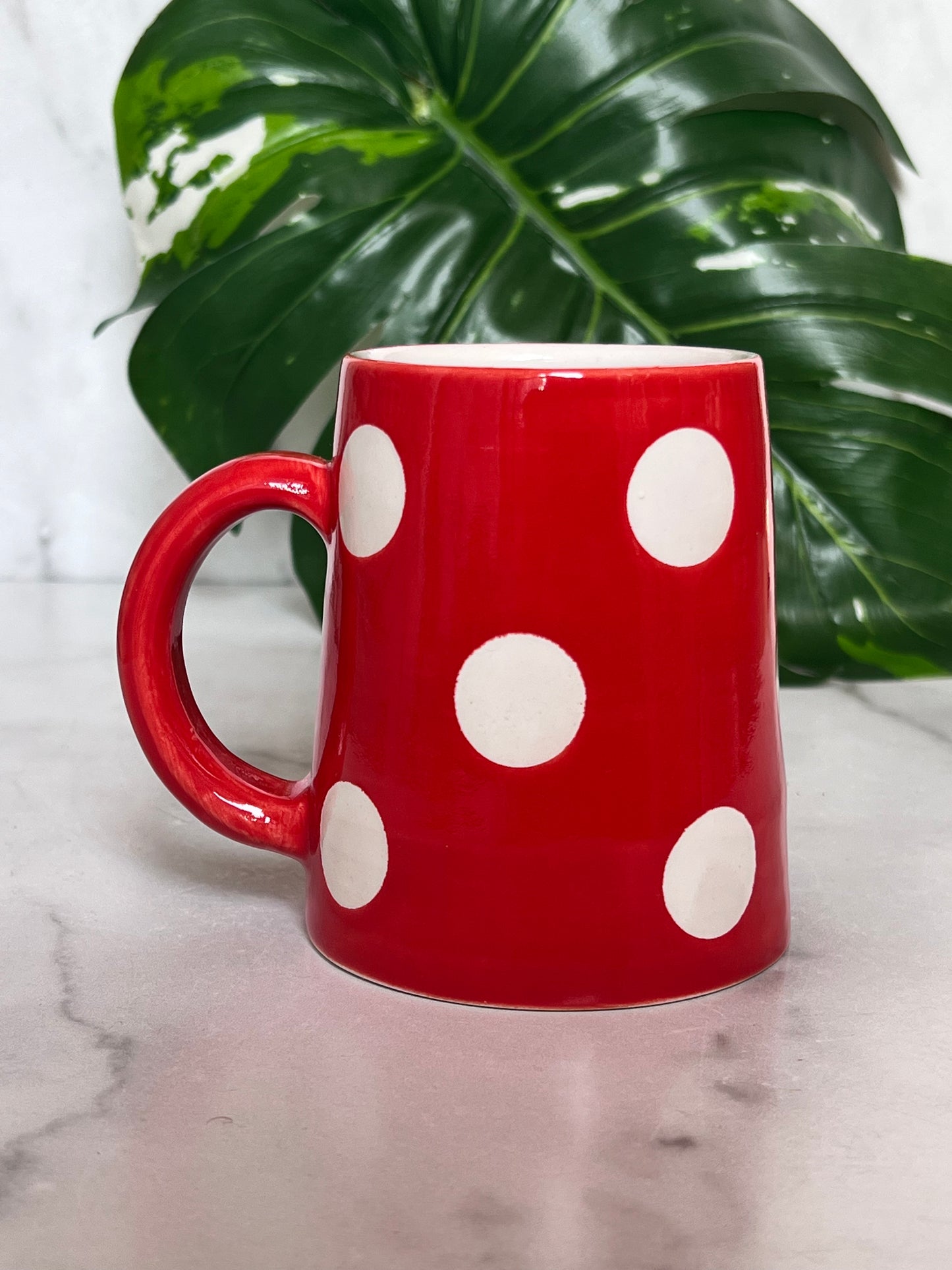 Red and white polka dot mug